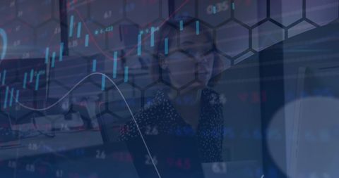 Businesswoman Analyzing Graphs and Data in Modern Workspace - Download Free Stock Images Pikwizard.com