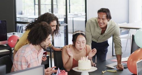 Diverse Team Celebrating Birthday with Cake in Office