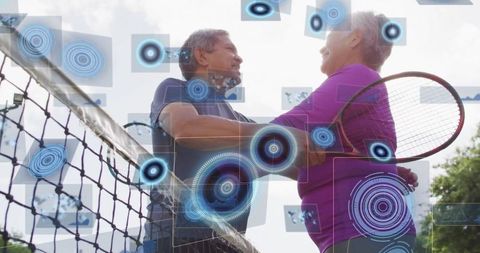 Elderly Couple Embracing on Tennis Court with Futuristic Digital Graphics
