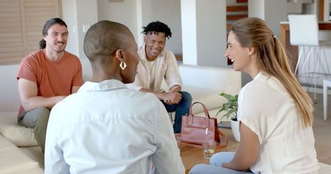 Diverse Friends Socializing in Cozy Living Room