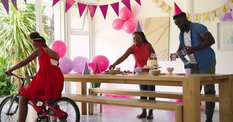 Family setting up for lively birthday celebration