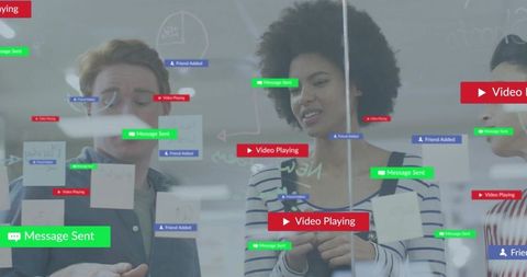 Collaborative brainstorming on glass with sticky notes, markers and digital overlays