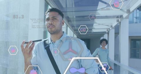 Man Engaging with Augmented Reality Technology in Modern Corridor