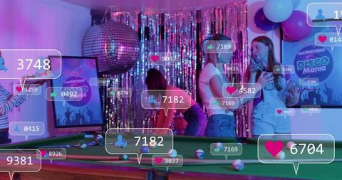 Young women playing pool at neon disco party with augmented reality social media overlays