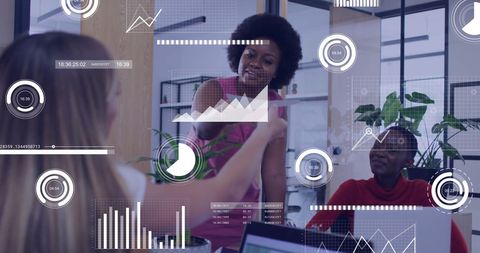 Business Team Analyzing Financial Data with Digital Interface Displays