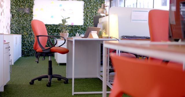 Modern Office Space with Orange Chairs and Greenery - Download Free Stock Images Pikwizard.com