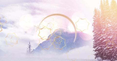 Misty Mountain Peak with Golden Accents in Winter Serenity