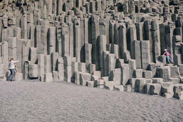 Tourists Exploring Columnar Basalt Rock Formations - Download Free Stock Photos Pikwizard.com