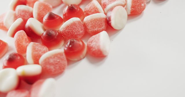 Assorted Red and White Gummy Candies on White Surface - Download Free Stock Images Pikwizard.com