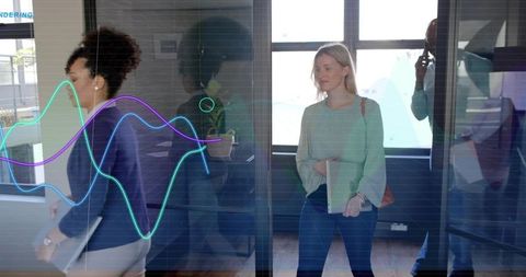 Team entering meeting through glass door with colorful data waveform reflection