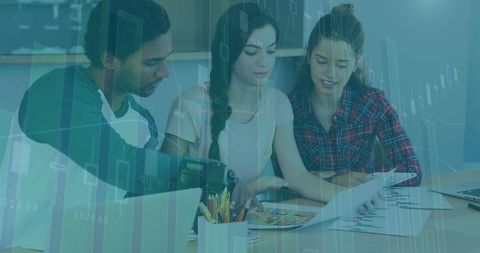 Diverse Team Analyzing Business Data in Office Setting - Download Free Stock Images Pikwizard.com