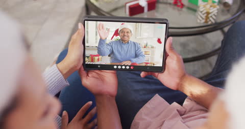 Couple Video Calling Elder Man for Christmas Connection