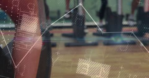 Group fitness class with digital interface and step platforms