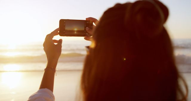 Woman Capturing Sunset on Smartphone at Beach - Download Free Stock Images Pikwizard.com