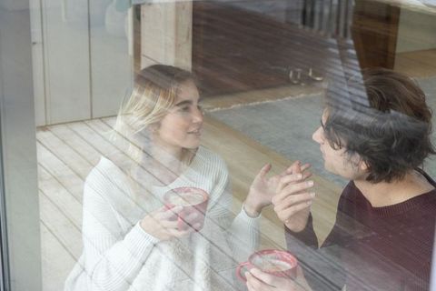 Peaceful Couple Enjoying Cozy Moment with Warm Mug Indoors