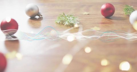Festive bokeh tabletop with dotted waveform overlay, holiday baubles, warm wood backdrop