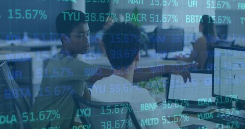 Diverse Coworkers Analyzing Data in Modern Office with Stock Ticker Overlay - Download Free Stock Images Pikwizard.com