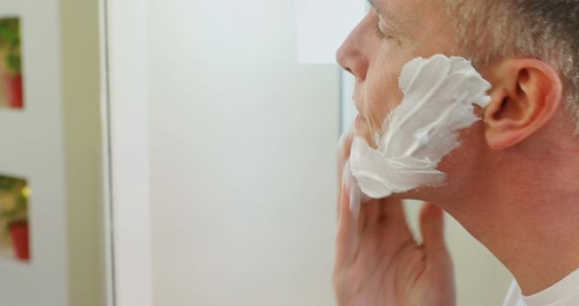 Man Applying Shaving Cream Preparation for Shaving Routine - Download Free Stock Images Pikwizard.com