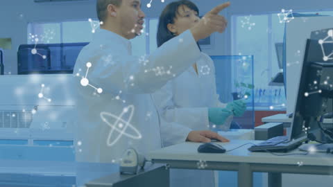 Team of Scientists Analyzing Data in a Modern Laboratory