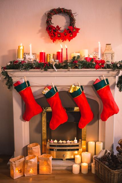 Fireplace decorate with christmas decor and ornaments in living room at home