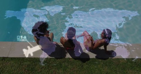Women Sharing Moments by Pool with Digital World Map Overlay