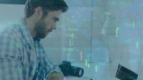 Businessman Analyzing Global Data on Computer