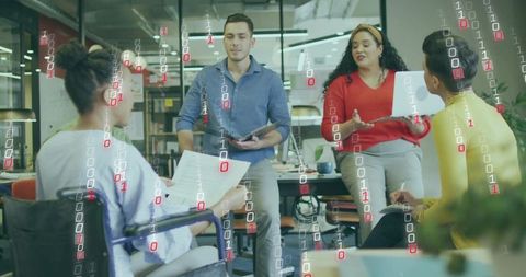 Diverse team collaborating in modern open-plan office with digital binary overlay