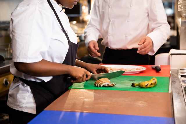 Chefs Collaborating in Restaurant Kitchen - Download Free Stock Photos Pikwizard.com