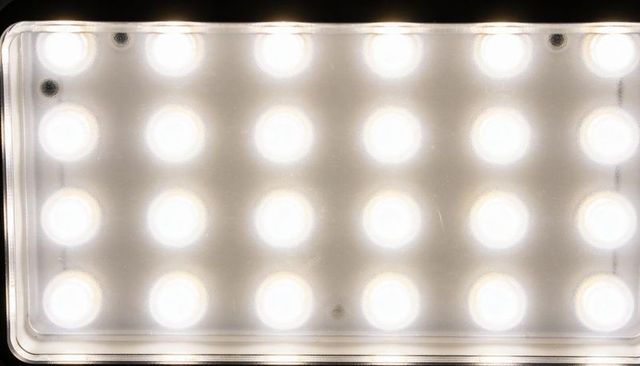 Illuminating led panel showing 24 diodes behind frosted diffuser with bezel and dust