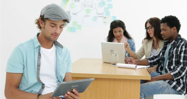 Young Multiracial Team Collaborating in Modern Office Setting - Download Free Stock Images Pikwizard.com