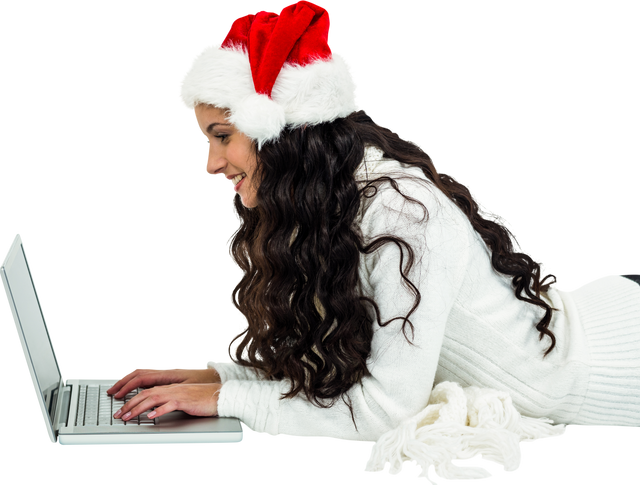 Transparent smiling woman in Santa hat using laptop browsing online - Download Free Stock Videos Pikwizard.com