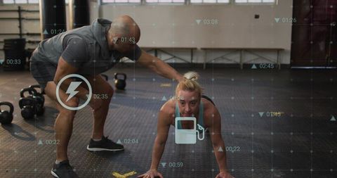 Coach Correcting Plank Form During High-Intensity Training with Digital HUD Overlays