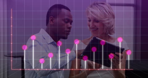 Diverse Business Team Analyzing Financial Data on Tablet With Digital Graphs