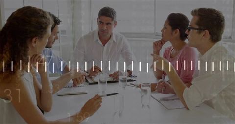 Business leader moderating team discussion with digital overlay for strategy and productivity