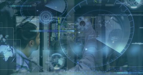Diverse IT Engineers Analyzing Data Servers with Digital Interface - Download Free Stock Images Pikwizard.com
