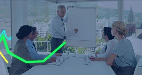 Executive Presenting Strategy on Flipchart to Team in Boardroom Overlooking City
