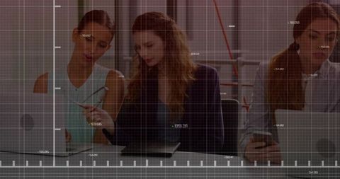 Women Collaborating on Tablet with HUD Overlay for Teamwork and Productivity in Office