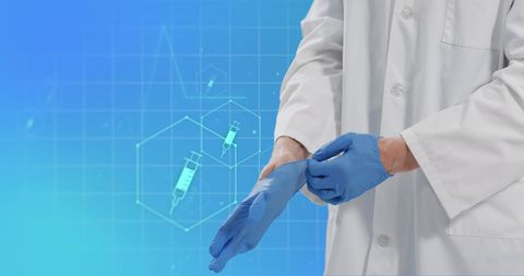 Doctor wearing gloves with medical technology interface