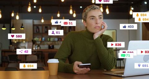 Woman Engaging with Social Media on Smartphone in Cozy Cafe Environment
