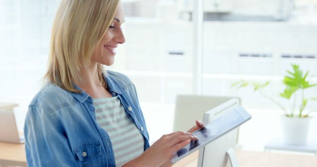 Woman in Casual Office Using Tablet - Download Free Stock Images Pikwizard.com