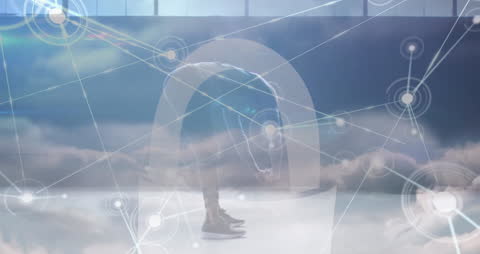 Digital Network with Man Exercising Against Cloud Background