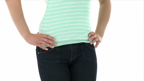 Woman Posing with Hands on Hips in Casual Outfit