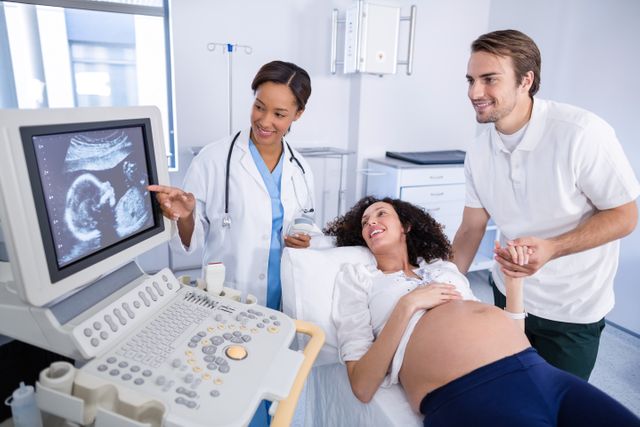 Doctor Performing Ultrasound Scan for Pregnant Woman - Download Free Stock Photos Pikwizard.com