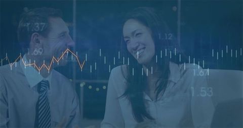 Corporate Professionals Analyzing Financial Charts at Night