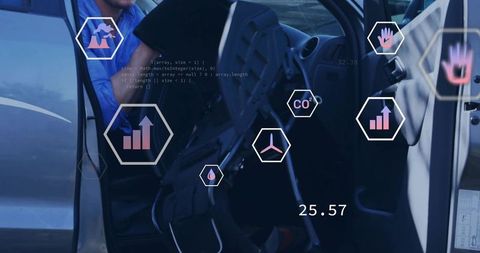 Mechanic inspecting car cabin with digital telemetry overlays and analytics dashboard