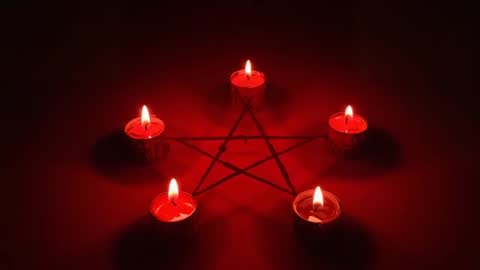 Pentagram Ceremonial Setup with Flickering Red Candles