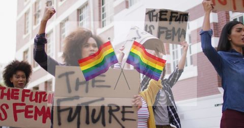 Diverse protesters advocating lgbt rights with bold signs