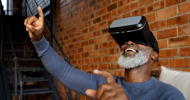 Smiling Elderly Man Using Virtual Reality Headset Outdoors - Download Free Stock Images Pikwizard.com