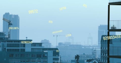 Digital Data Overlay on Urban Skyline for Technology Concept