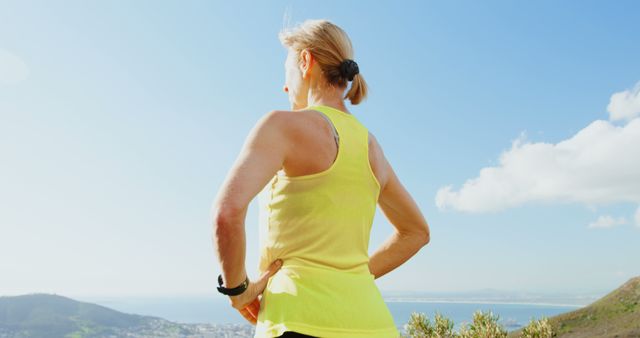 Middle-aged Woman Viewing Scenic Landscape during Outdoors Exercise - Download Free Stock Images Pikwizard.com